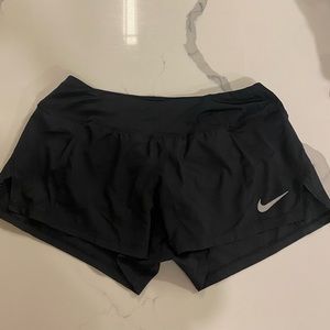 Nike black running shorts w functional draw string Size M. In like new condition